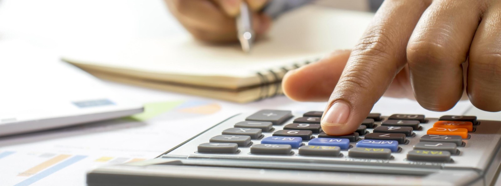 person using calculator