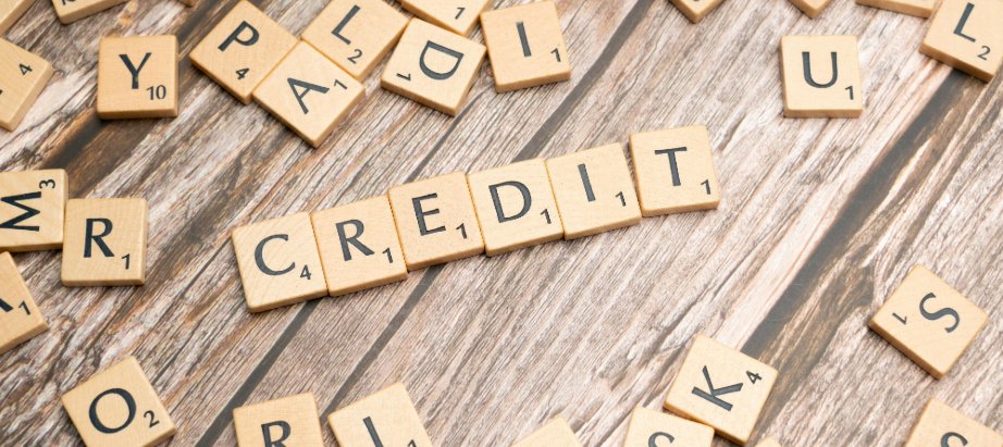 credit wooden letter blocks